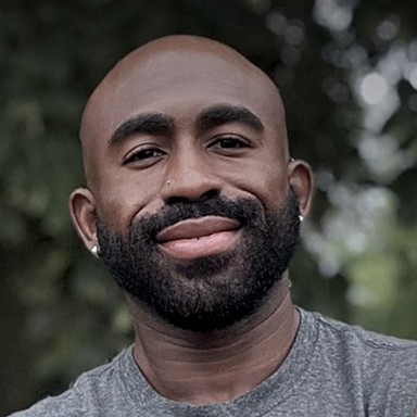 Coach Rashad smiling